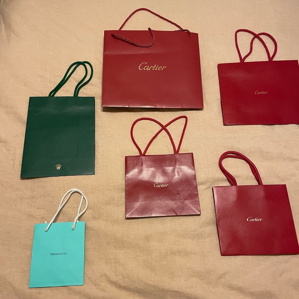 Cartier Tiffany and Rolex bags
